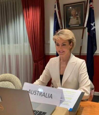 Richard Price wife Michaelia Cash attending a conference meeting.